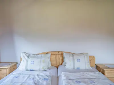 Ein Bett oder Betten in einem Zimmer der Unterkunft Weberhof Top 2