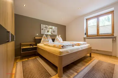 Ein Bett oder Betten in einem Zimmer der Unterkunft Almliesl HOLL-453