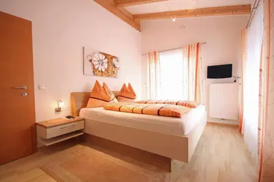 Ein Bett oder Betten in einem Zimmer der Unterkunft Almliesl HOLL-453