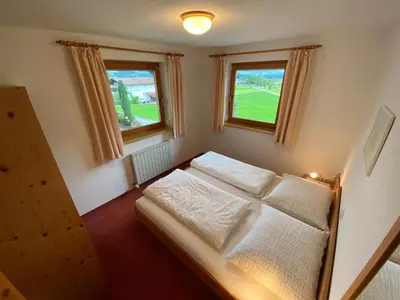 Ein Bett oder Betten in einem Zimmer der Unterkunft Appartement Haselsperger