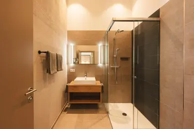 Ein Badezimmer in der Unterkunft REMIND Apartements Brixental