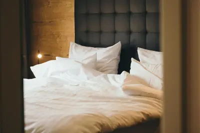 Ein Bett oder Betten in einem Zimmer der Unterkunft REMIND Apartements Brixental