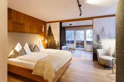 Ein Bett oder Betten in einem Zimmer der Unterkunft Landhotel Schermer