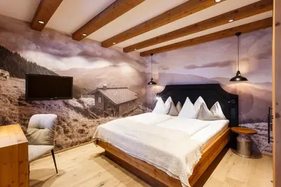 Ein Bett oder Betten in einem Zimmer der Unterkunft Landhotel Schermer