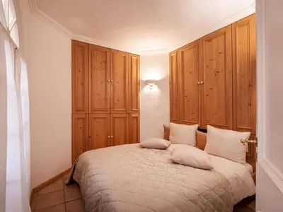Ein Bett oder Betten in einem Zimmer der Unterkunft Ferienwohnungen Egger