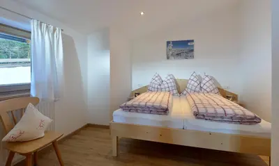 Ein Bett oder Betten in einem Zimmer der Unterkunft Appartement Bergfried