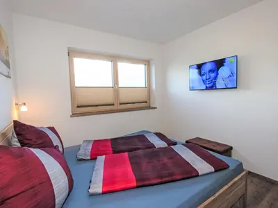 Ein Bett oder Betten in einem Zimmer der Unterkunft Apartment Dengg by Interhome