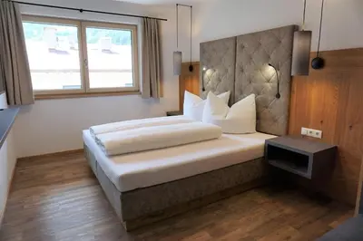 Ein Bett oder Betten in einem Zimmer der Unterkunft Apart Mountain