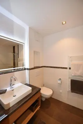 Ein Badezimmer in der Unterkunft Krölls Alpenchalet