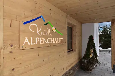 Ein Zertifikat, Auszeichnung, Logo oder anderes Dokument, das in der Unterkunft Krölls Alpenchalet ausgestellt ist