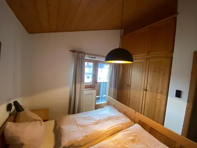 Ein Bett oder Betten in einem Zimmer der Unterkunft Ferienwohnung HOAMAT