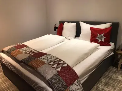 Ein Bett oder Betten in einem Zimmer der Unterkunft Ferienwohnung Waldglück
