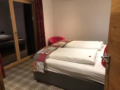 Ein Bett oder Betten in einem Zimmer der Unterkunft Ferienwohnung Waldglück