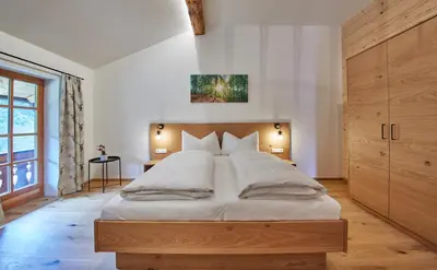 Ein Bett oder Betten in einem Zimmer der Unterkunft Feriengut Streitberg Appartements