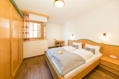 Ein Bett oder Betten in einem Zimmer der Unterkunft Feriengut Hasenau