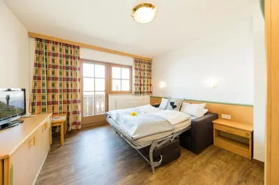 Ein Bett oder Betten in einem Zimmer der Unterkunft Feriengut Hasenau