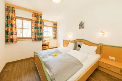 Ein Bett oder Betten in einem Zimmer der Unterkunft Feriengut Hasenau