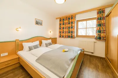 Ein Bett oder Betten in einem Zimmer der Unterkunft Feriengut Hasenau