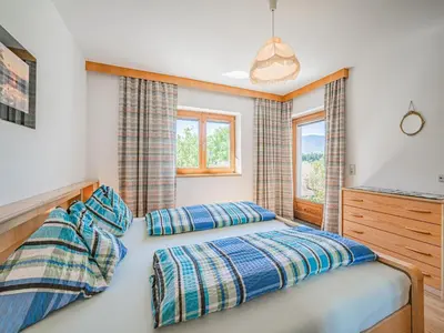 Ein Bett oder Betten in einem Zimmer der Unterkunft Haus Steger