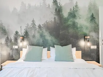 Ein Bett oder Betten in einem Zimmer der Unterkunft Tirola Bude Resi Top 1