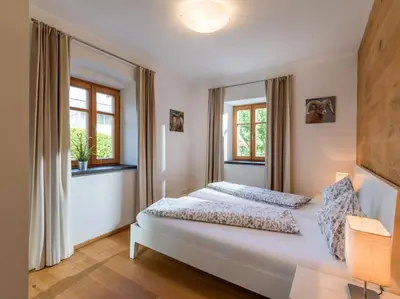 Ein Bett oder Betten in einem Zimmer der Unterkunft Villa Grete, St. Johann in Tirol