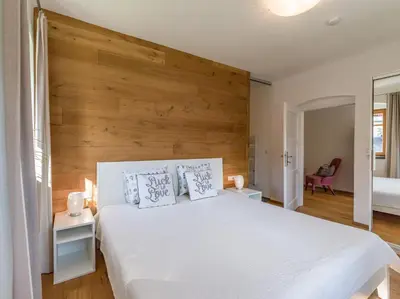 Ein Bett oder Betten in einem Zimmer der Unterkunft Villa Grete, St. Johann in Tirol