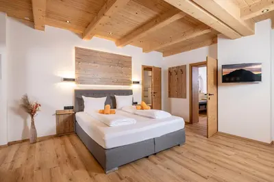 Ein Bett oder Betten in einem Zimmer der Unterkunft Apart Stiegler