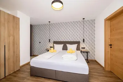 Ein Bett oder Betten in einem Zimmer der Unterkunft Apart Stiegler