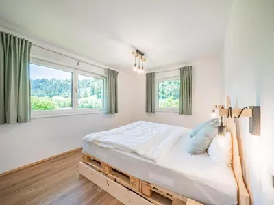Ein Bett oder Betten in einem Zimmer der Unterkunft Tirola Bude Resi Schorsch Top 1-2