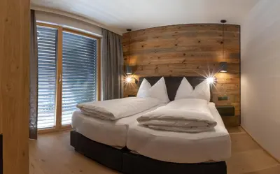 Ein Bett oder Betten in einem Zimmer der Unterkunft Sport Apart