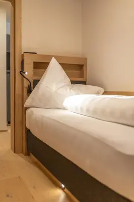 Ein Bett oder Betten in einem Zimmer der Unterkunft Sport Apart