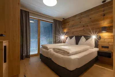Ein Bett oder Betten in einem Zimmer der Unterkunft Sport Apart