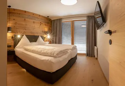 Ein Bett oder Betten in einem Zimmer der Unterkunft Sport Apart