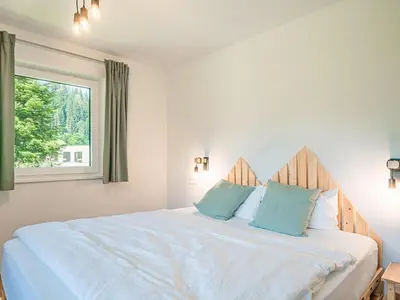 Ein Bett oder Betten in einem Zimmer der Unterkunft Tirola Bude