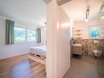 Ein Bett oder Betten in einem Zimmer der Unterkunft Tirola Bude Sepp Top 4