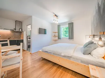 Ein Bett oder Betten in einem Zimmer der Unterkunft Tirola Bude Lisi Top 3
