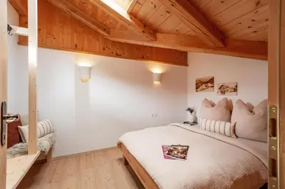 Ein Bett oder Betten in einem Zimmer der Unterkunft Ferienwohnung Tenn