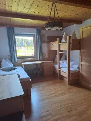 Ein Bett oder Betten in einem Zimmer der Unterkunft Glückchalet