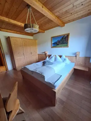 Ein Bett oder Betten in einem Zimmer der Unterkunft Glückchalet