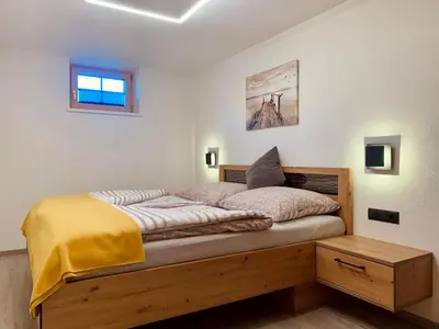 Ein Bett oder Betten in einem Zimmer der Unterkunft Apartment Silberwald