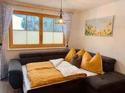 Ein Sitzbereich in der Unterkunft Apartment Silberwald