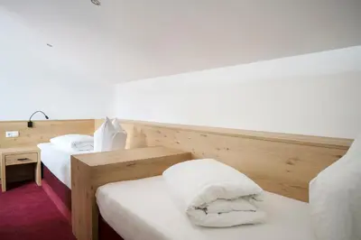 Ein Bett oder Betten in einem Zimmer der Unterkunft Aparthotel Schindlhaus und Koia Premium Apartments