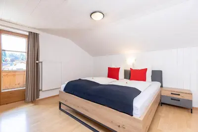 Ein Bett oder Betten in einem Zimmer der Unterkunft Ferienhaus Anna