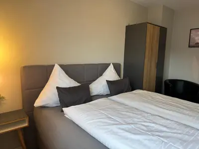 Ein Bett oder Betten in einem Zimmer der Unterkunft Gästehaus Johannes