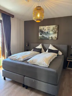 Ein Bett oder Betten in einem Zimmer der Unterkunft Gästehaus Johannes