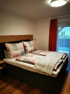 Ein Bett oder Betten in einem Zimmer der Unterkunft Apart Pichler