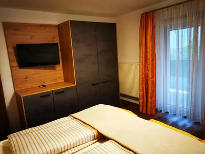 Ein Bett oder Betten in einem Zimmer der Unterkunft Apart Pichler