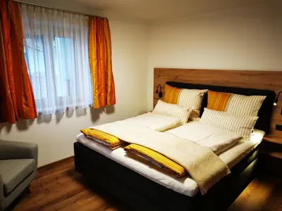 Ein Bett oder Betten in einem Zimmer der Unterkunft Apart Pichler
