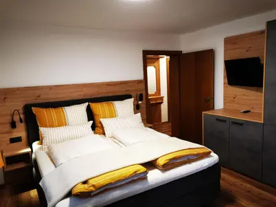 Ein Bett oder Betten in einem Zimmer der Unterkunft Apart Pichler