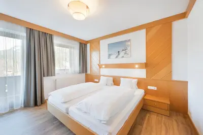 Ein Bett oder Betten in einem Zimmer der Unterkunft Der Waldhof
